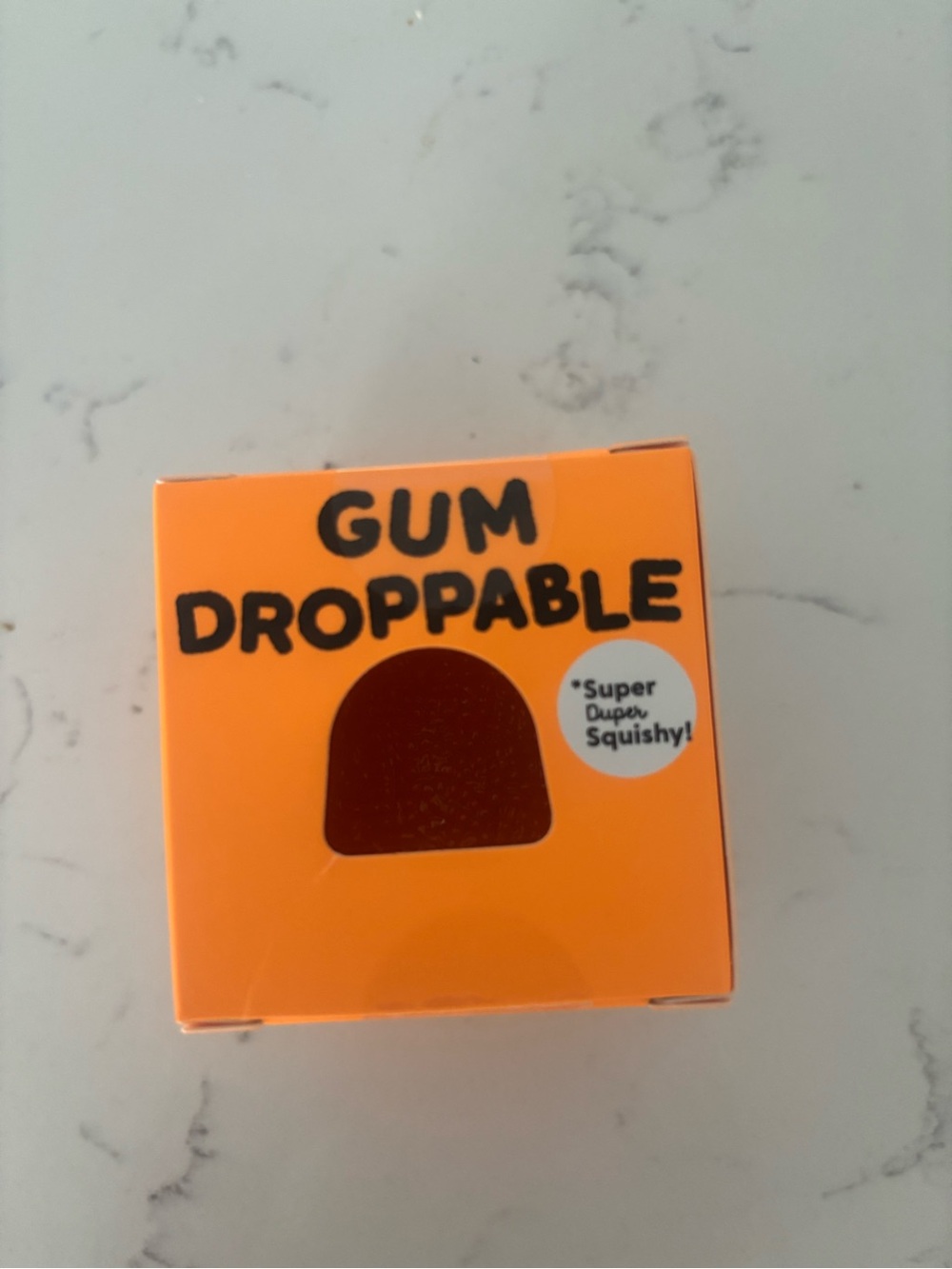 Gum Droppable Orange Squishy Toy by